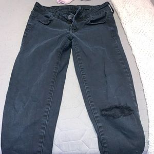 American Eagle Black Jeans with hole in left knee